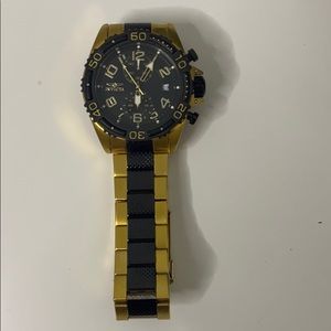 Invicta gold and black watch